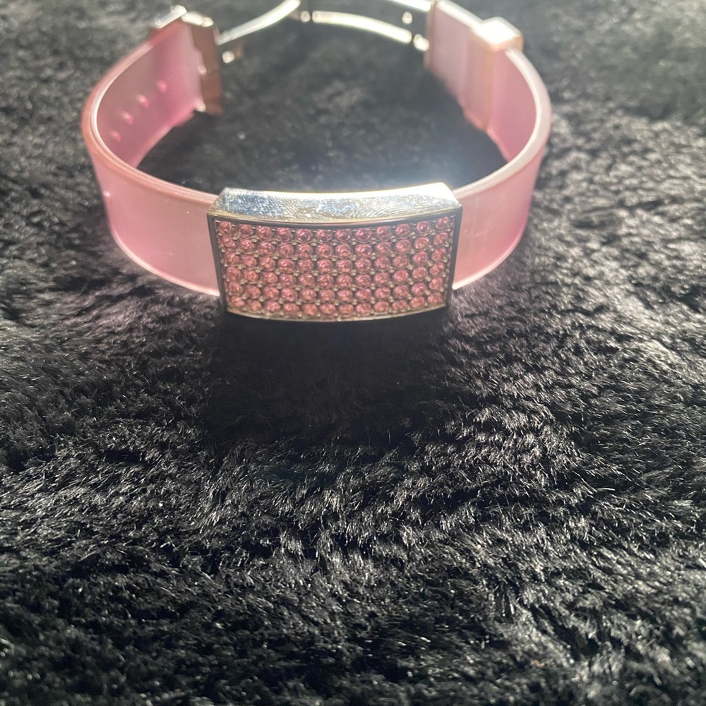 Pink crystal adjustable band bracelet.